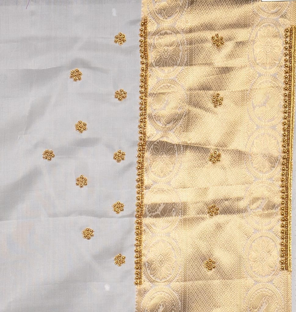 White Saree With Golden Zari Embroidery