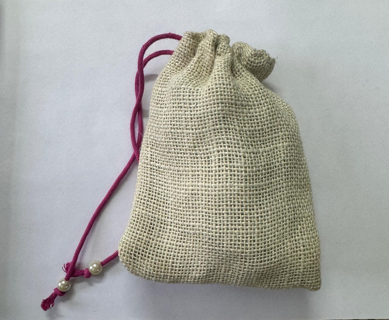 Multicolored embroidered jute potli