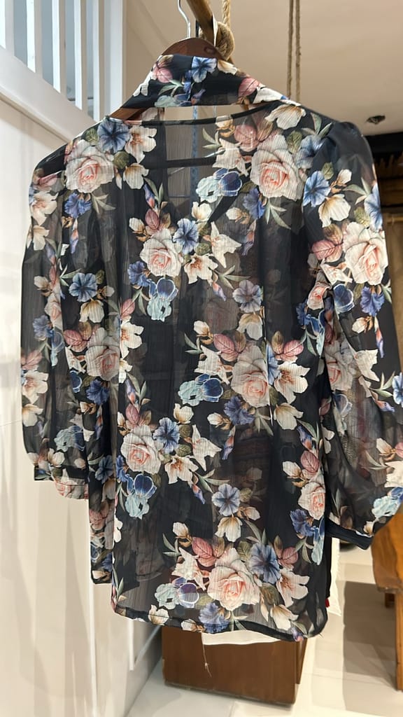 Stylish Women Semi-sheer black top with a flowy design Top 2025 at ShopCircuit | ONDC