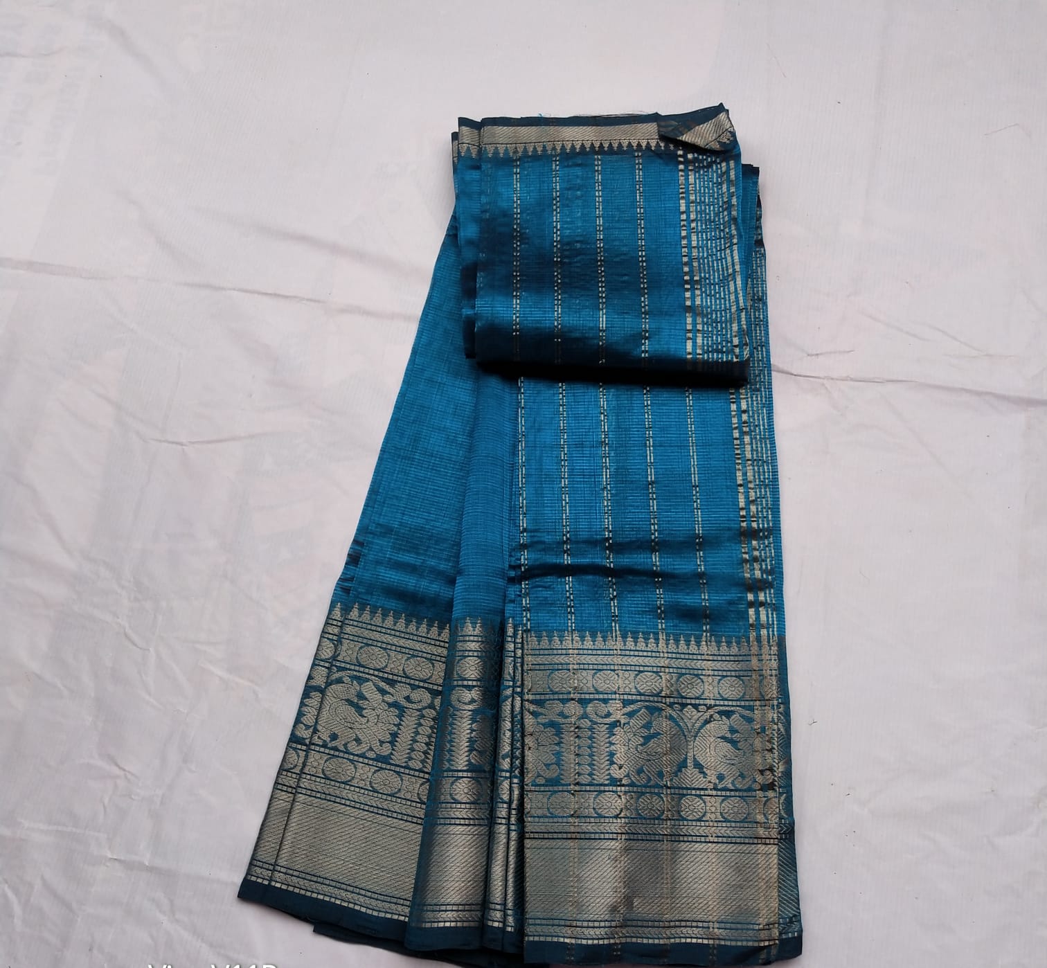 Blue Linen Saree With Golden Zari Border