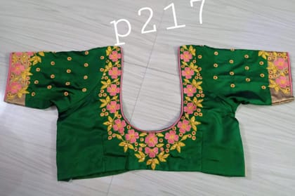 Green blouse with floral embroidery Green blouse with floral embroidery