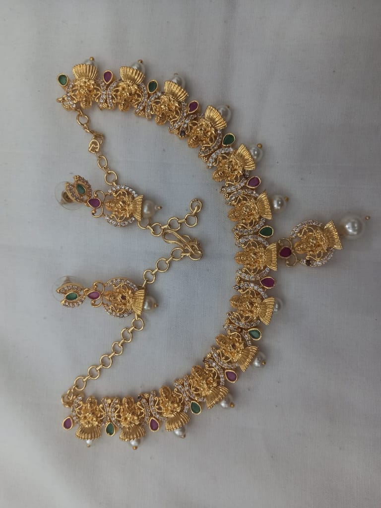  "Stunning Lakshmi Temple Jewelry Set in Gold with Pearls and Green Stones" - Jewellery Sets | Buy online on ZillyBuy