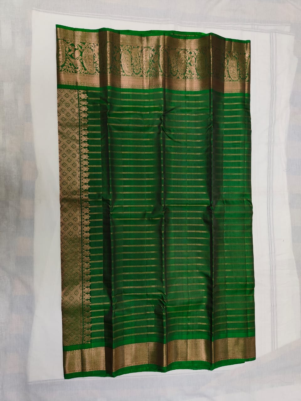 Green and Gold Silk Saree with Peacock Motifs