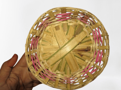  **Handwoven Bamboo Basket with Pink Accents**