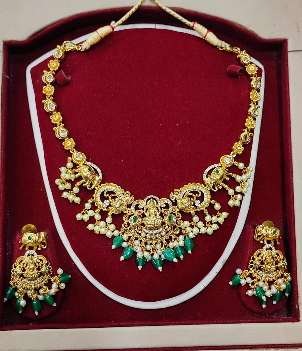  "Stunning Gold-Plated Traditional Indian Necklace Set with Pearls and Green Stones"
