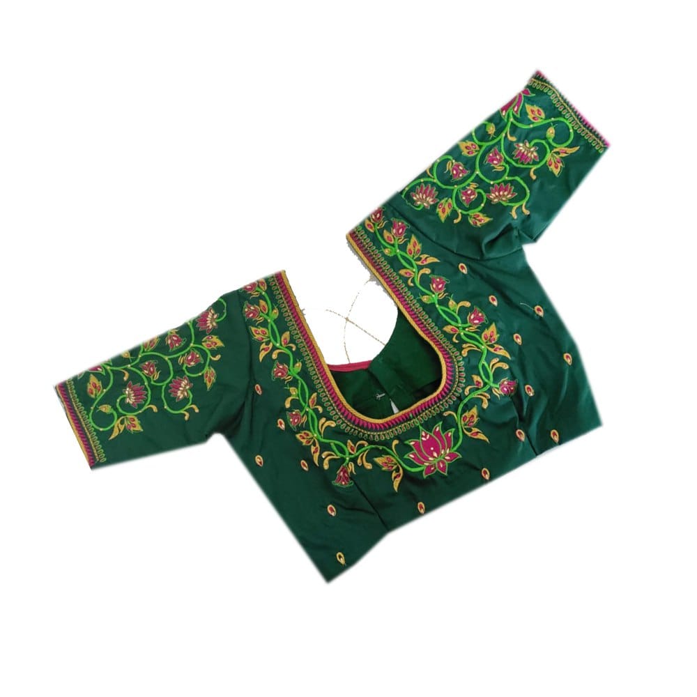 Green blouse with intricate floral embroidery