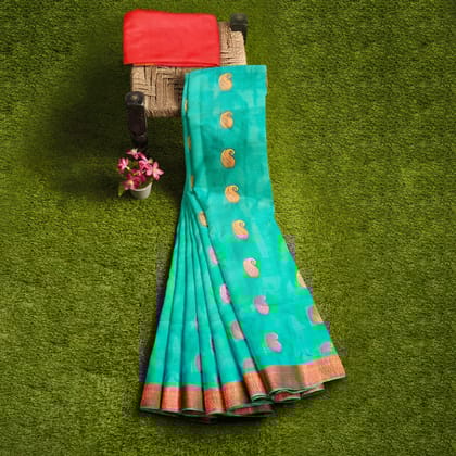 Seafoam green printed pure soft silk saree with golden zari border