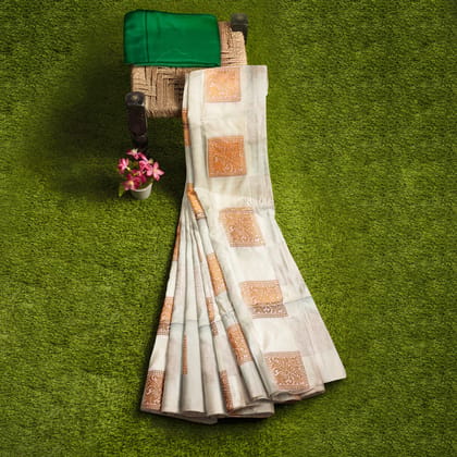 White and beige color pure  soft silk saree with zari woven floral buttas