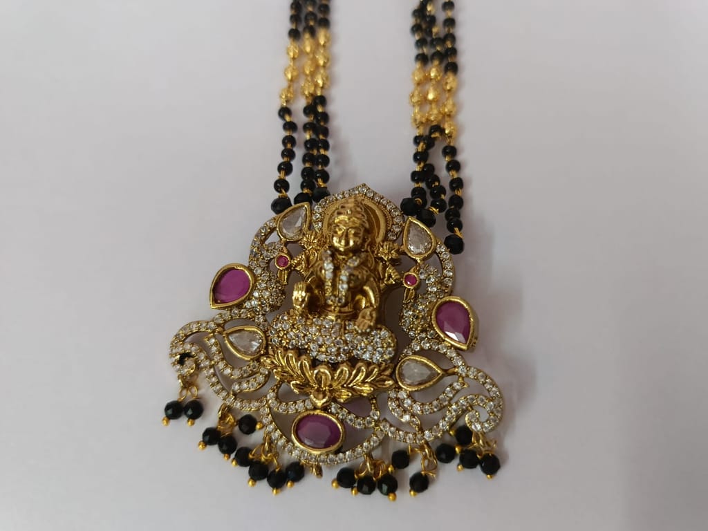 Trendy Women "Stunning antique gold plated Goddess Lakshmi earrings with intricate detailing and