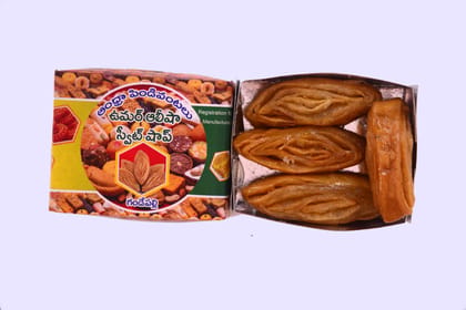  A box of four pieces of Mysore Pak, a traditional Indian sweet