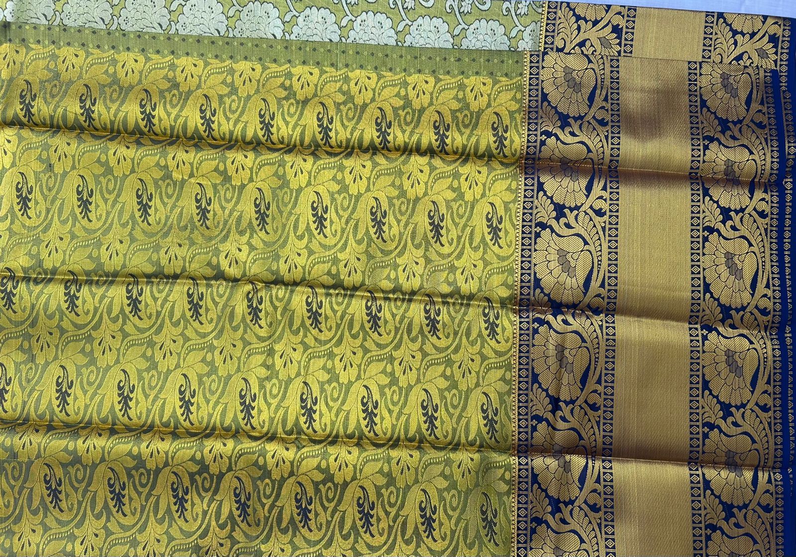 Green and gold zari woven Kanchipuram silk saree