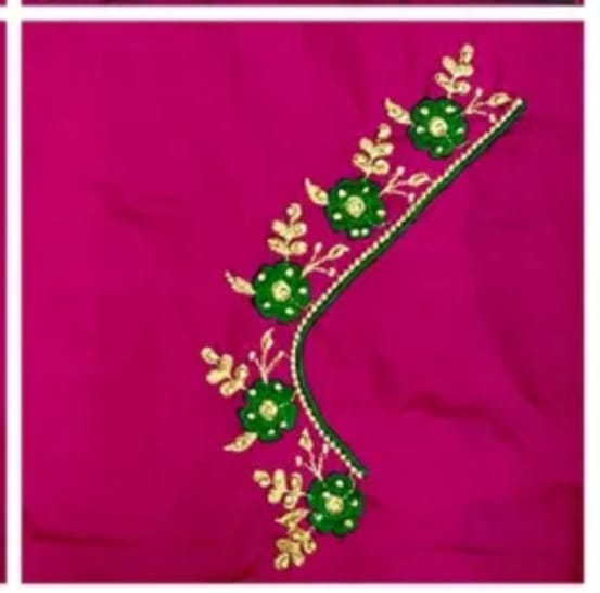 Pink and green embroidered blouse with floral motifs