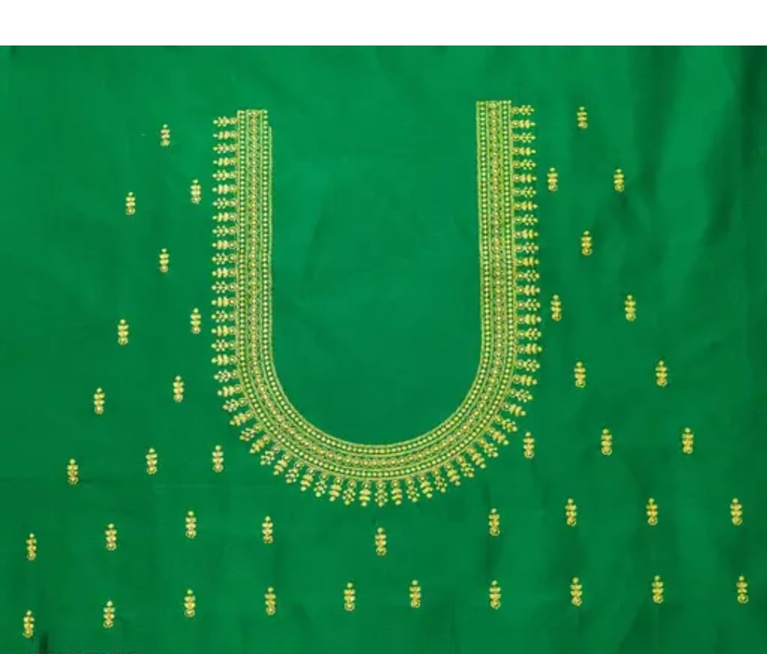  Green blouse with intricate zari embroidery