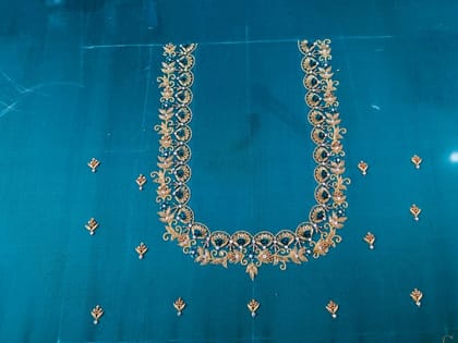 Green and gold embroidered blouse