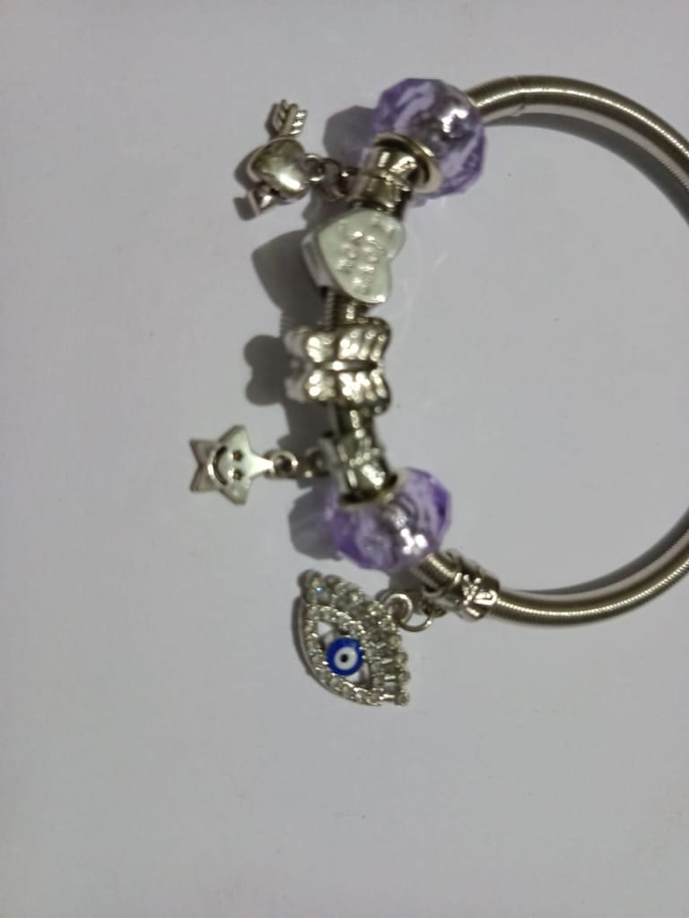 Charm Bracelet with Purple Beads and Silver Charms