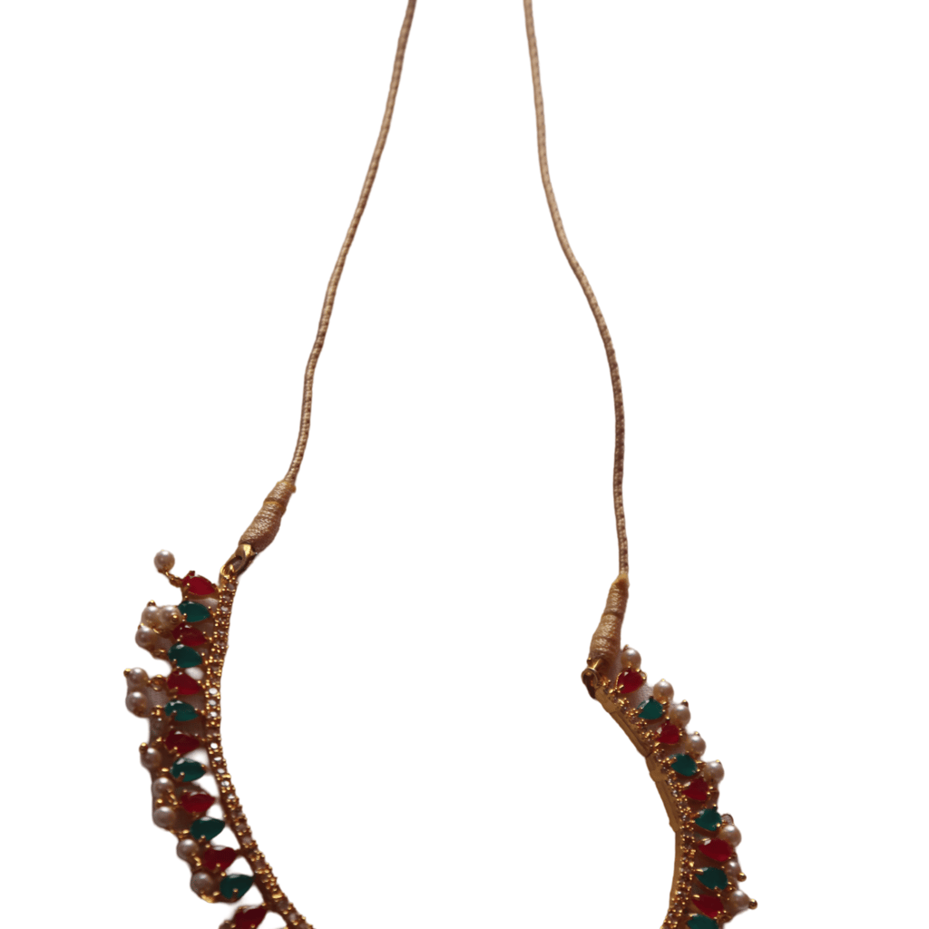 Pearl and gold necklace with red and green stones