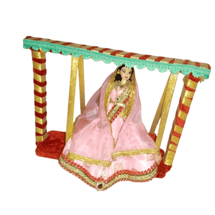 Exquisite Indian Bride Doll in Traditional Pink Lehenga on a Miniature Swing - Perfect for Home Decor and Gifting"