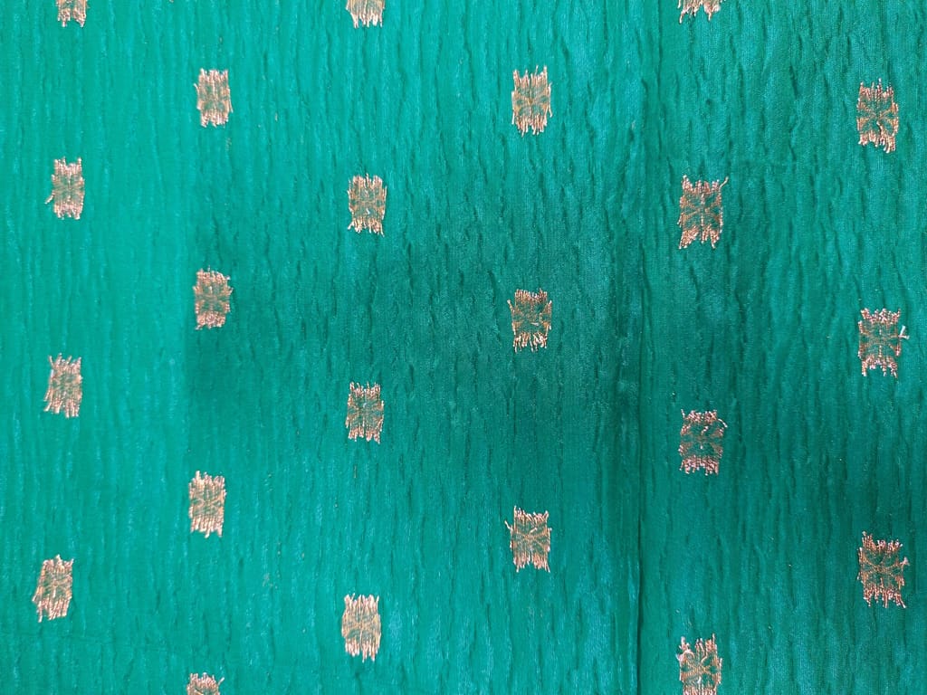 Green Banarasi Silk Saree With Zari Woven Floral Butta And Border