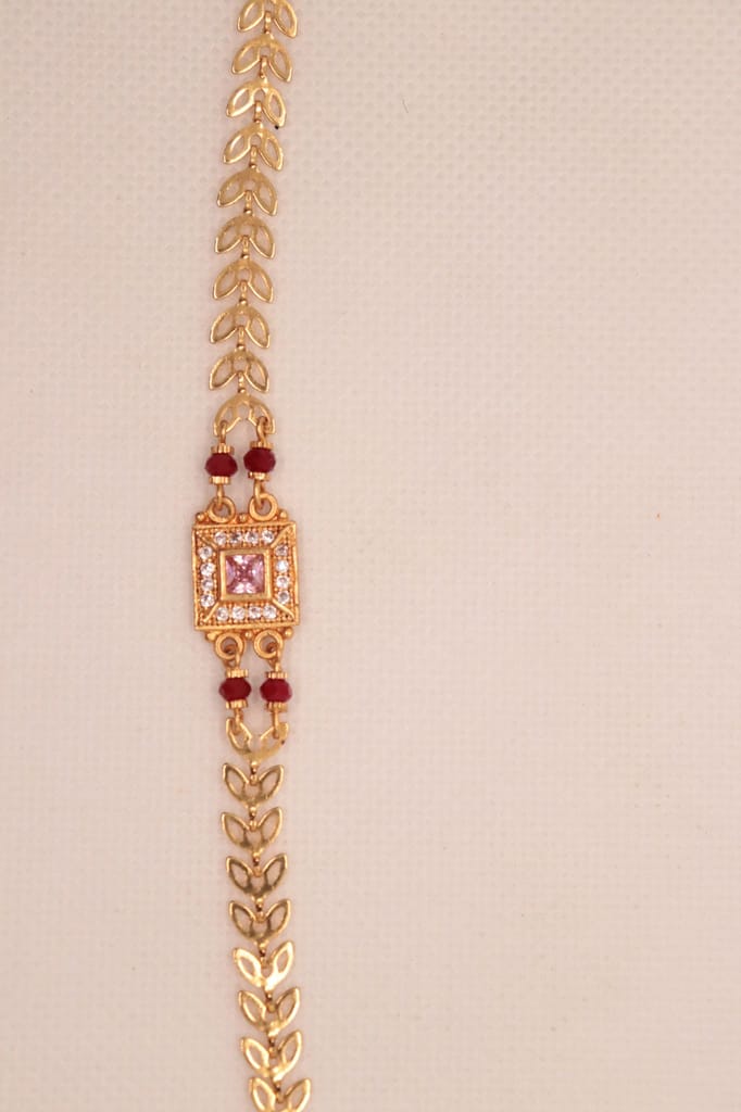 Bracelet with Center Square Pink Stone Surrounded by Clear Stones and Red Stones