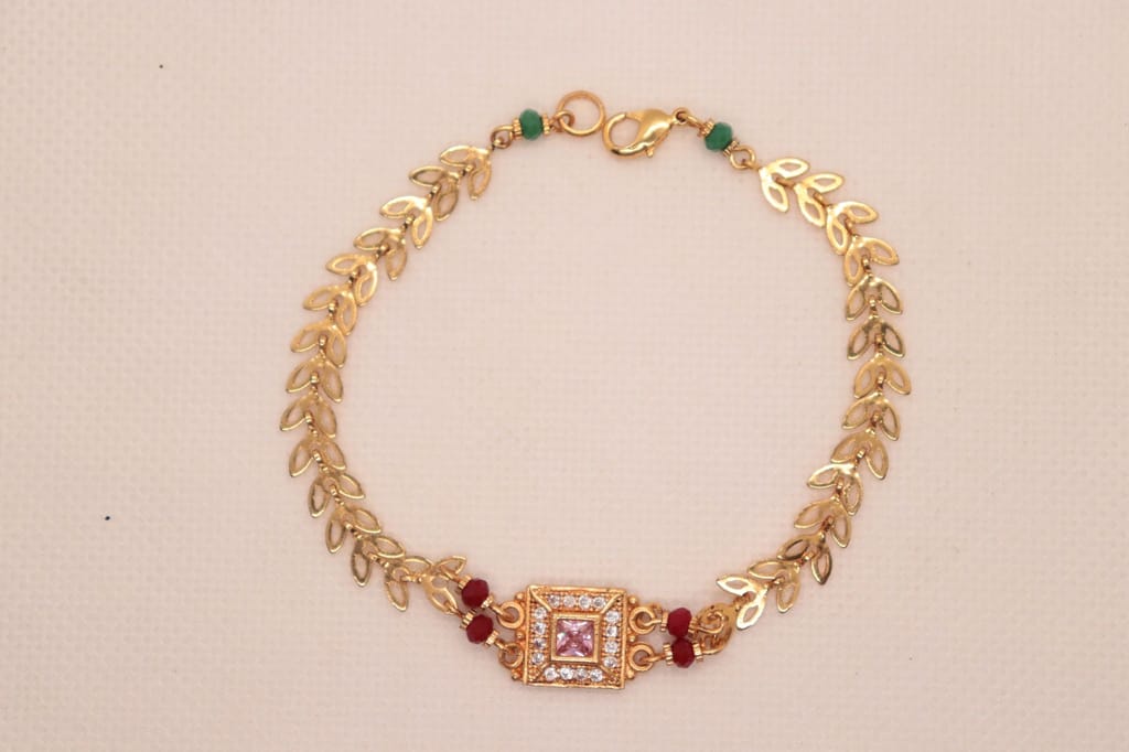 Bracelet with Center Square Pink Stone Surrounded by Clear Stones and Red Stones