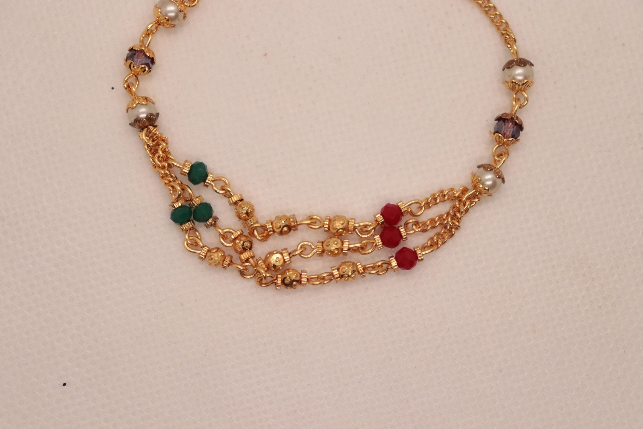 Pearl and Gold Plated Bracelet with Green and Red Beads