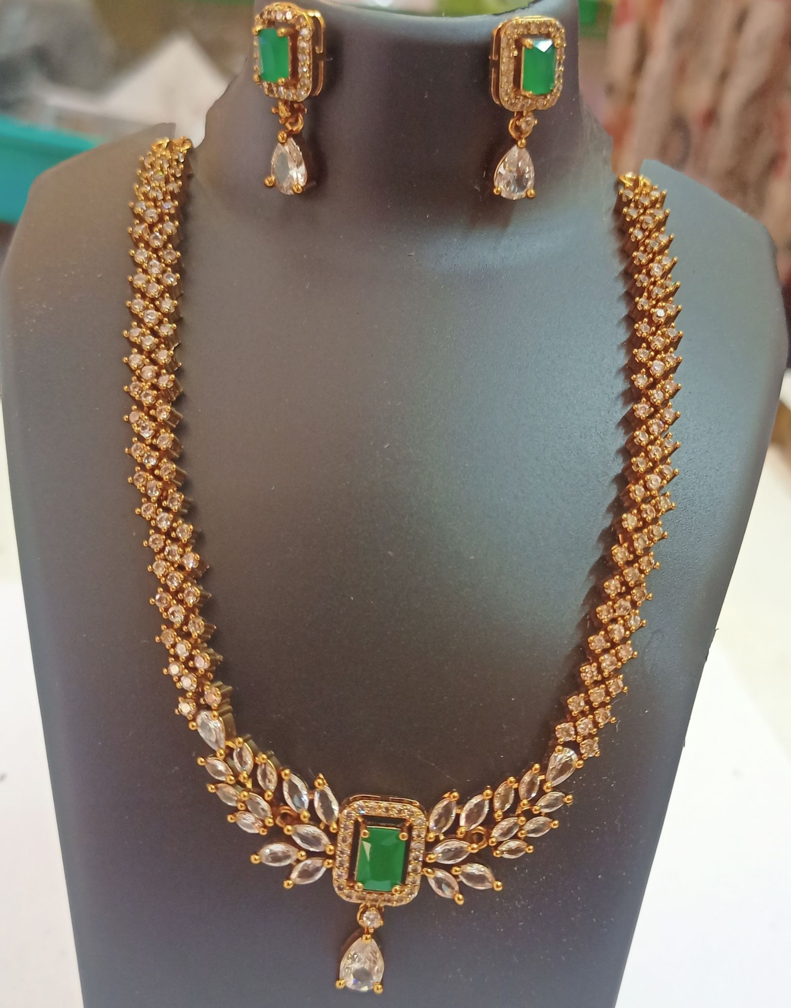 American Diamond Necklace Set with Green Stones and Gold Plating