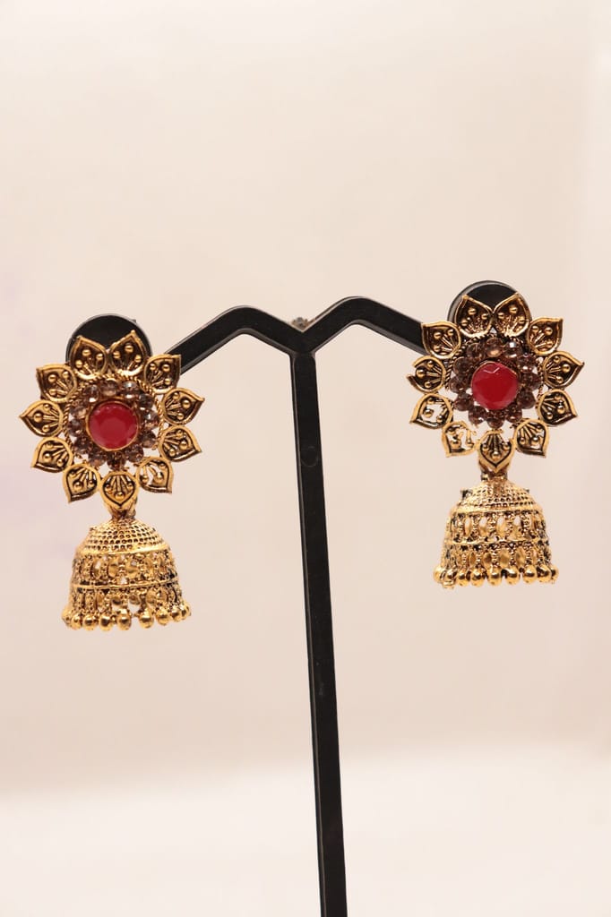 "Stunning Red Stone Jhumka Earrings with Intricate Gold Design"