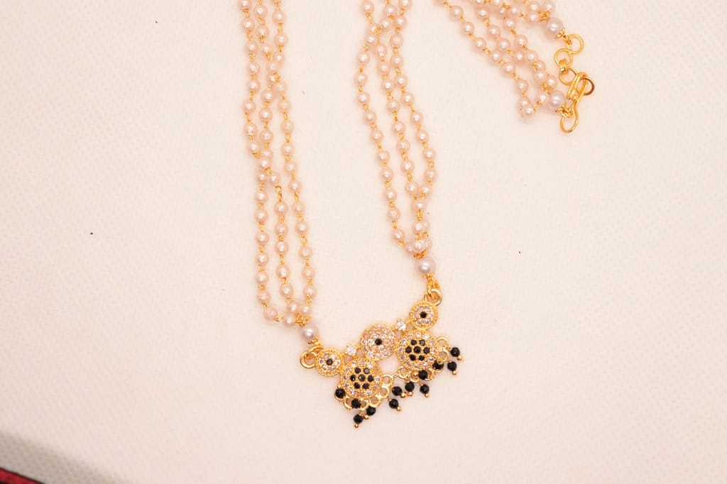 Pearl and gold haram with pendant