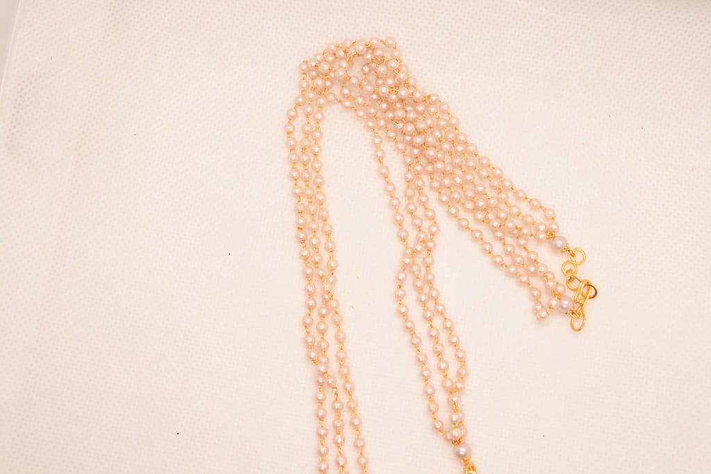 Pearl and gold haram with pendant