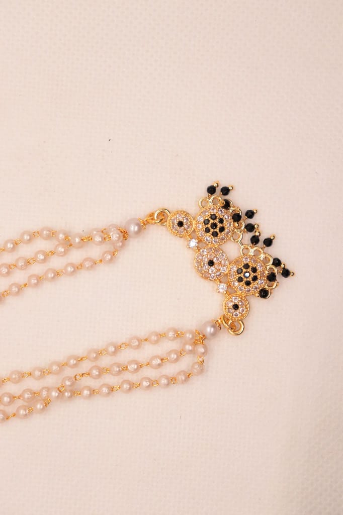 Pearl and gold haram with pendant