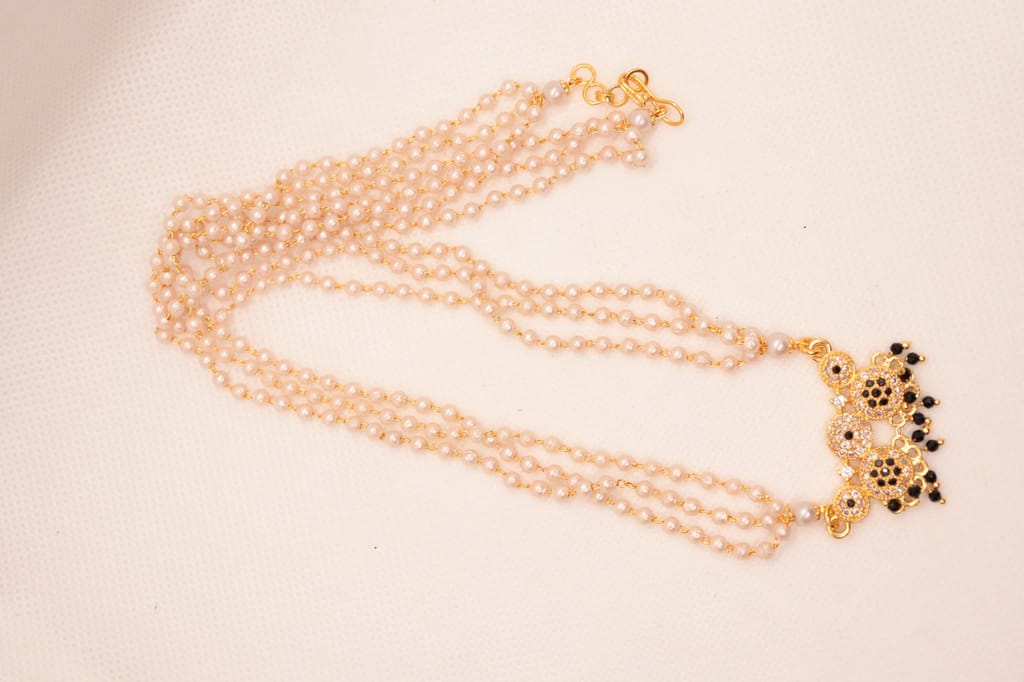 Pearl and gold haram with pendant