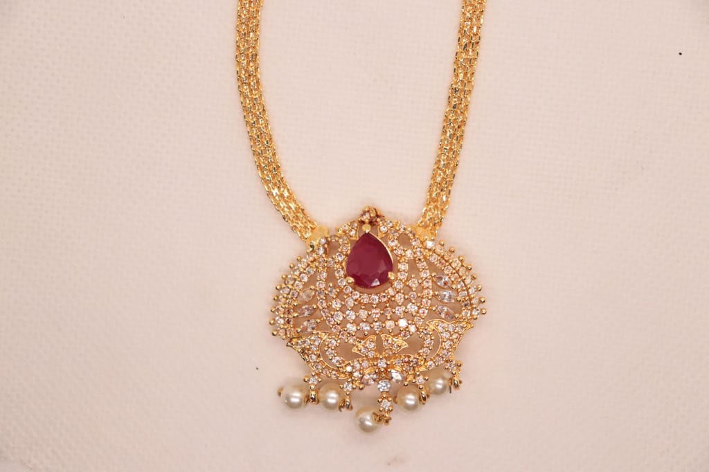 Gold Plated AD Stone Pendant Set with Ruby Stone and Pearls - Jewellery Sets | Buy online on ZillyBuy