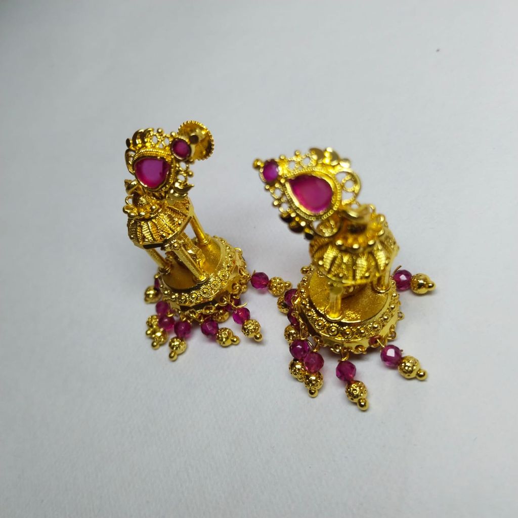 Gold Temple Jhumka Earrings with Pink Stones