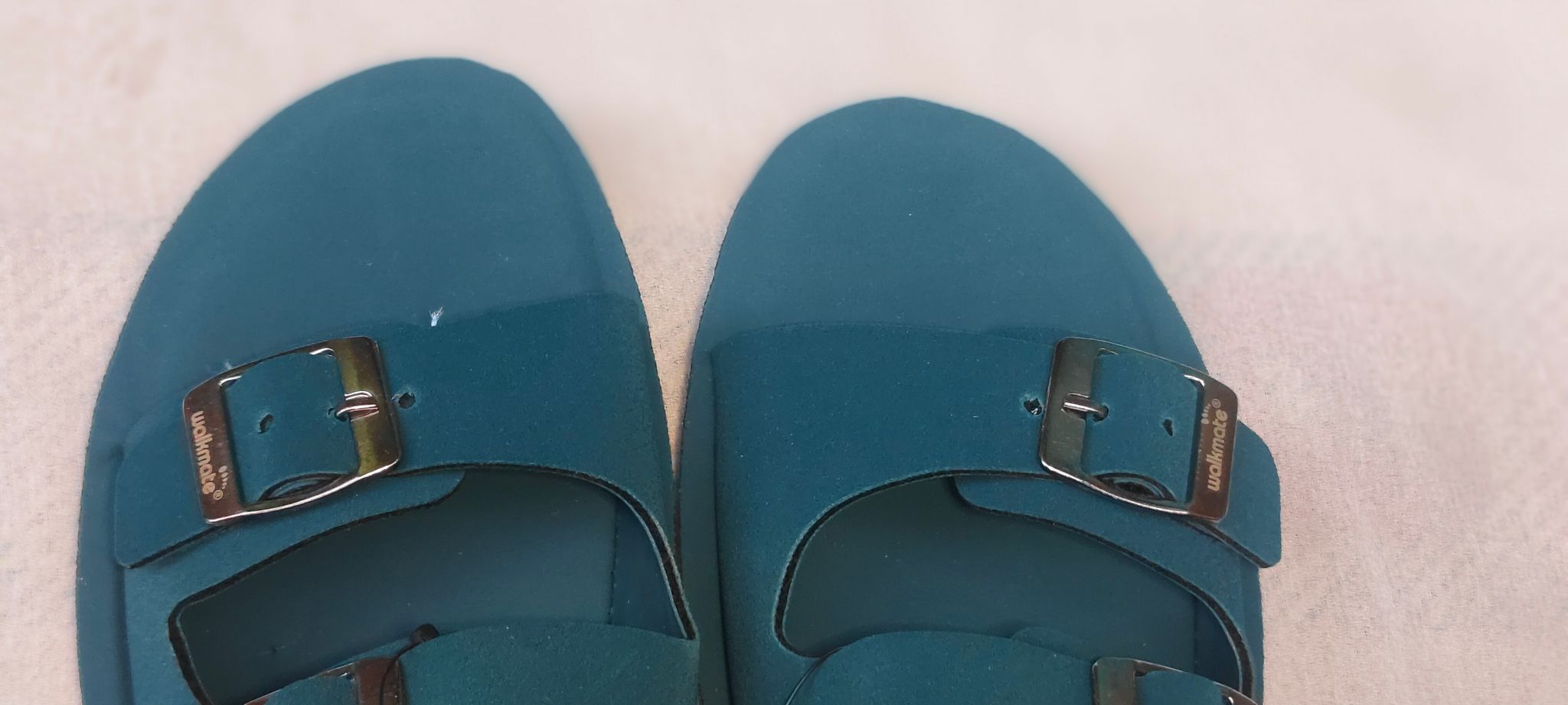 blue two-strap sandals with buckles are the perfect summer shoe.