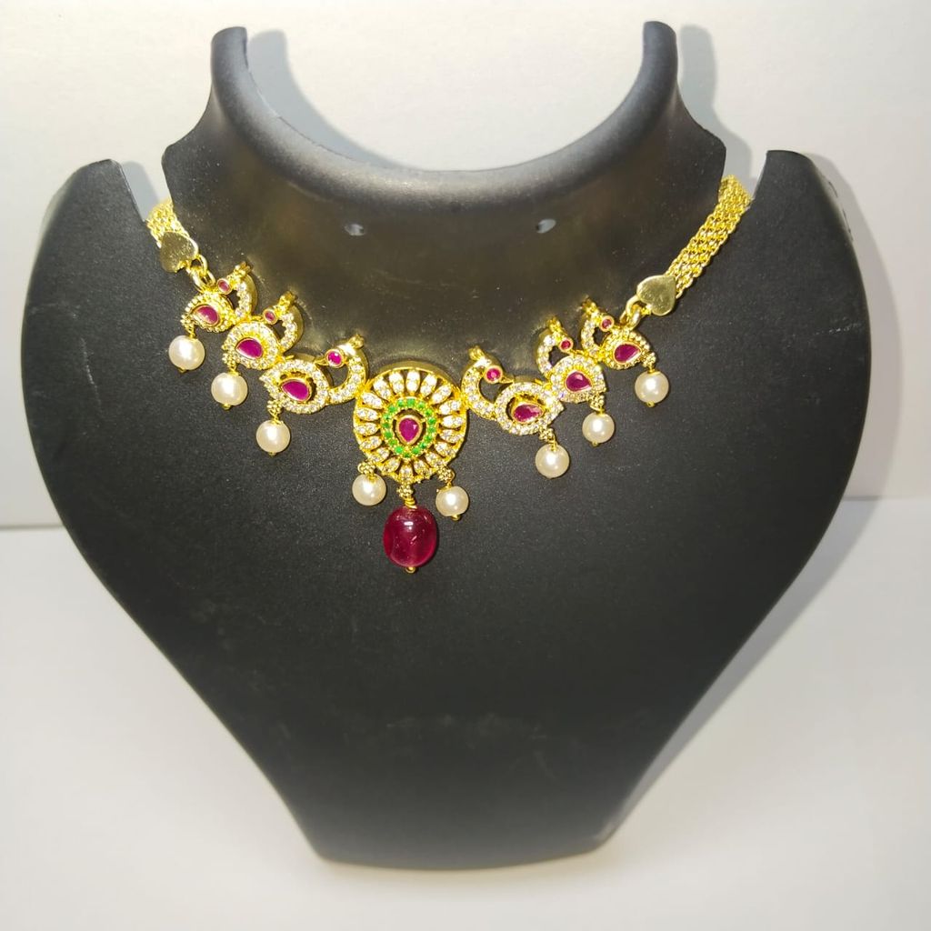 Gold Necklace with Peacock Motif and Pearls