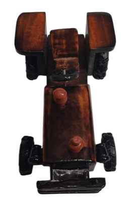Wooden toy tractor handcrafted from a single piece of wood. Perfect for children