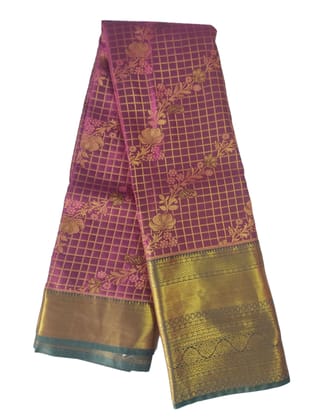 maroon and gold silk saree with floral design Description.This beautiful maroon and gold silk saree is perfect for any special occasion. The intricate floral design adds a touch of elegance, while the gold border adds a touch of luxury.