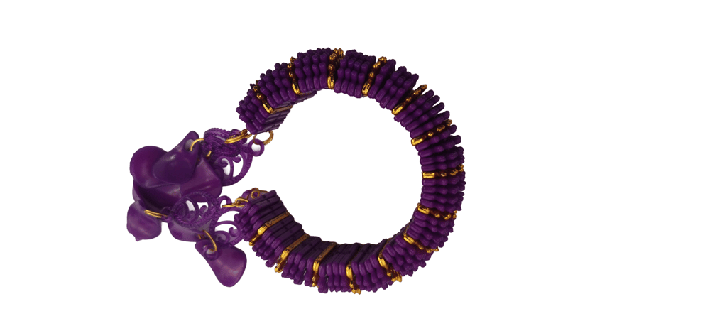 Gold and purple beaded bracelet with unique design
