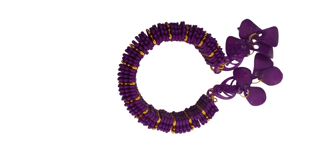 Gold and purple beaded bracelet with unique design