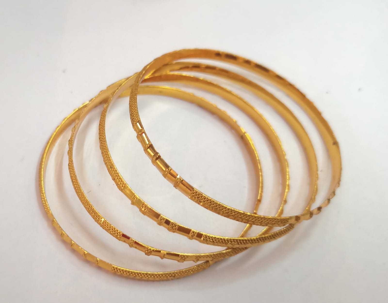 "Exquisite 22K Gold Bangles Set of 4 - Perfect for Traditional Indian Weddings and Festivals"