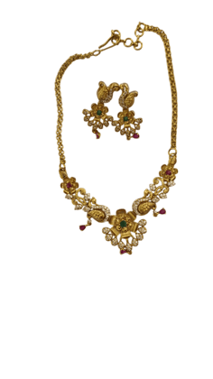 Gold-plated traditional Indian necklace set with intricate floral design and ruby and emerald stones