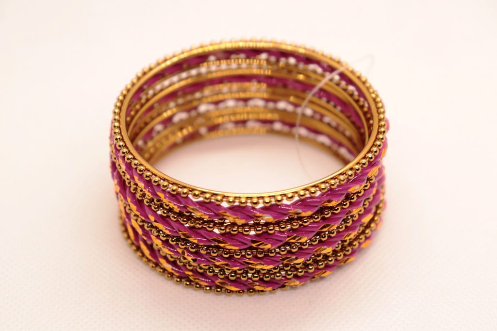 "Exquisite Fuchsia and Gold Bangle Set - Perfect for Traditional Indian Attire"