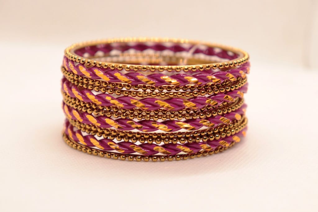 "Exquisite Fuchsia and Gold Bangle Set - Perfect for Traditional Indian Attire"