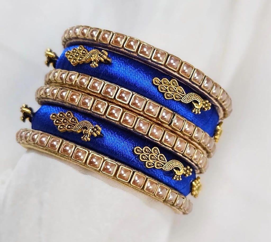 Set of 6 Blue Silk Thread Bangles with Golden Peacock Design and Pearl Beads