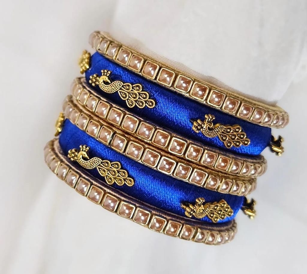 Set of 6 Blue Silk Thread Bangles with Golden Peacock Design and Pearl Beads