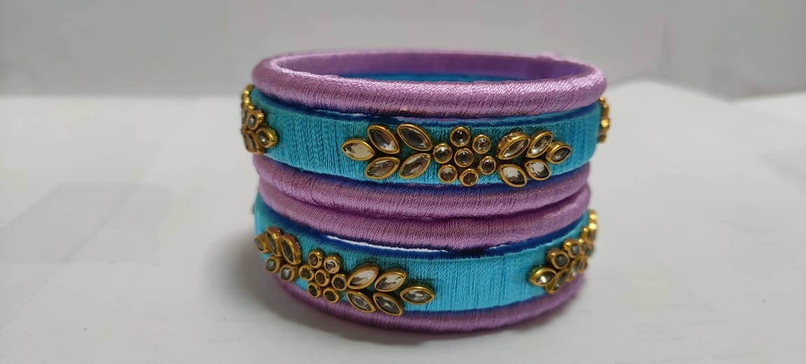 Set of 4 Silk Thread Bangles with Stone and Pearl Embellishment in Sky Blue and Lavender