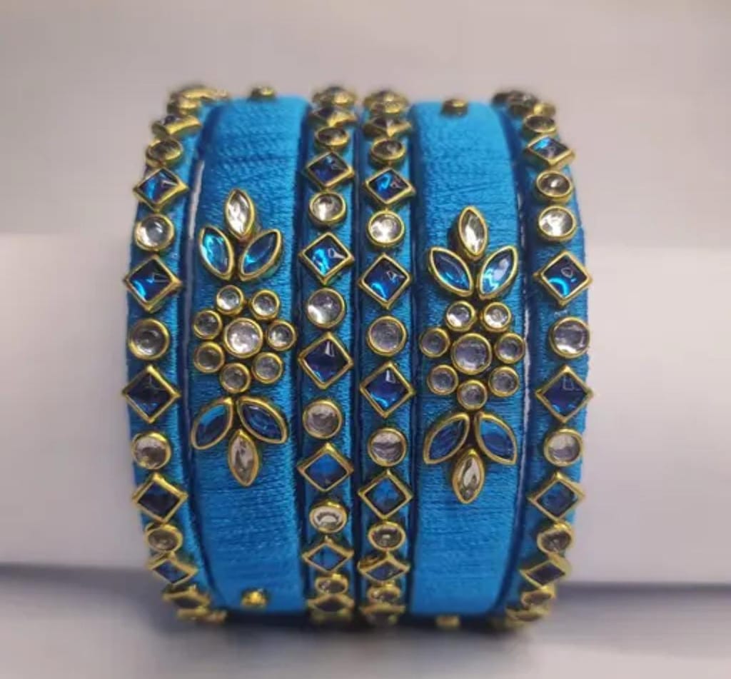 Blue Silk Thread Bangle Set with Stone and Pearl Embellishment