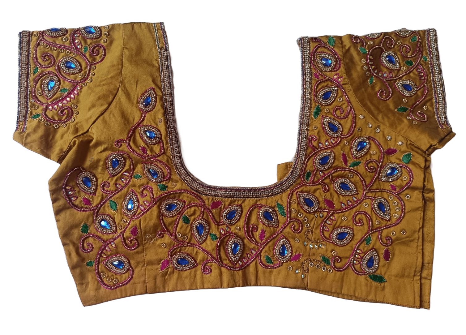 Golden color maggam work blouse with intricate embroidery and mirror work