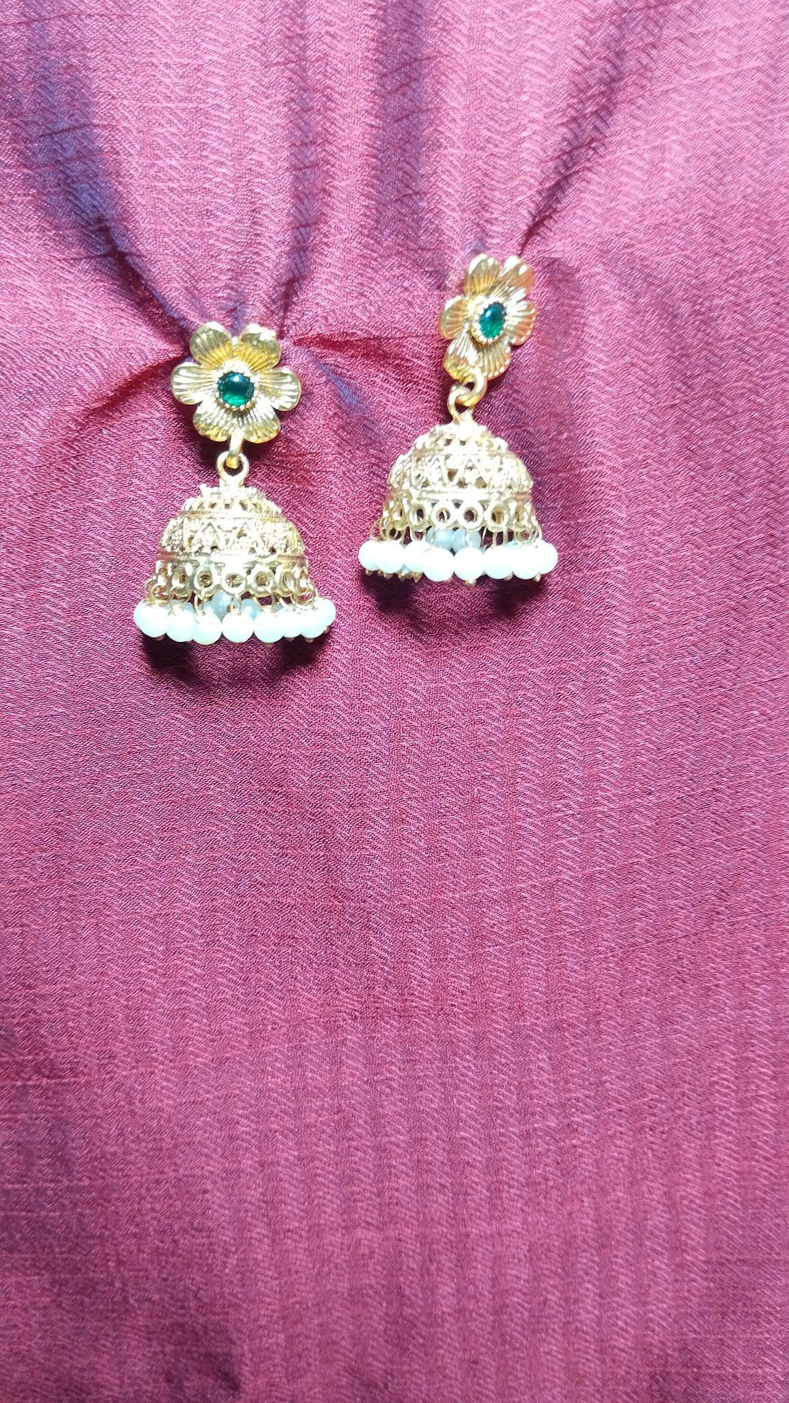 "Stunning Gold Plated Pearl and Green Stone Jhumka Earrings for Women"
