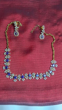 Stunning American Diamond Necklace Set with Blue Stones and Gold-Plated Chain for Women